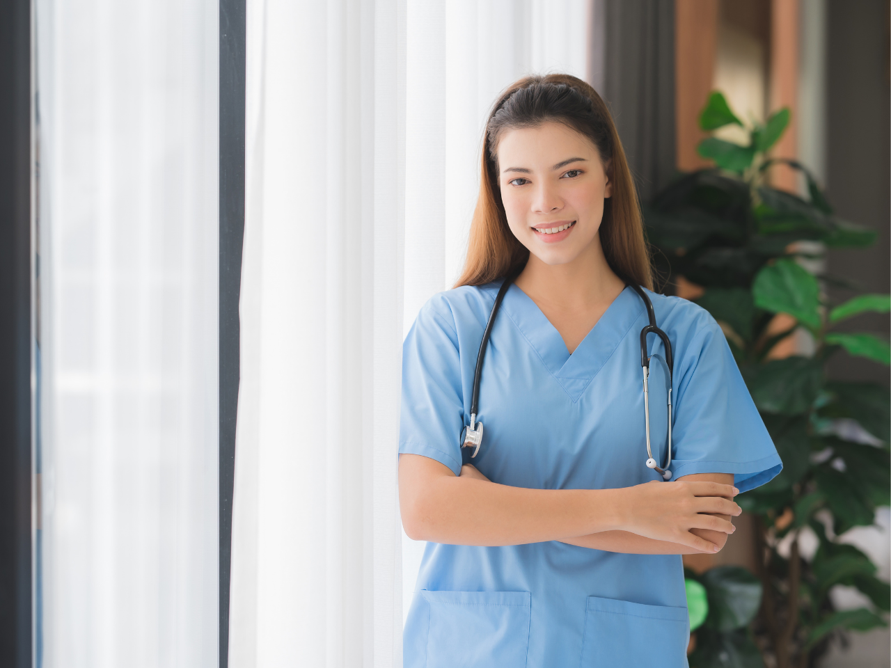 Asian Beautiful Nurse or Caregiver