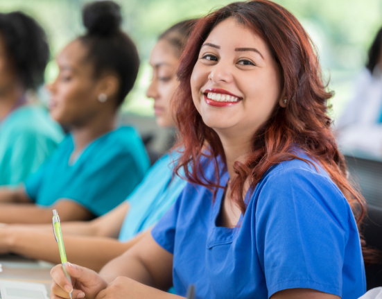 Female nurse attending a workshops