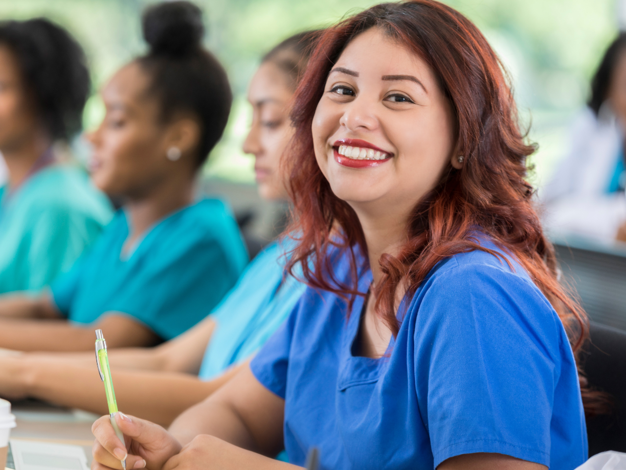 Female nurse attending a workshops