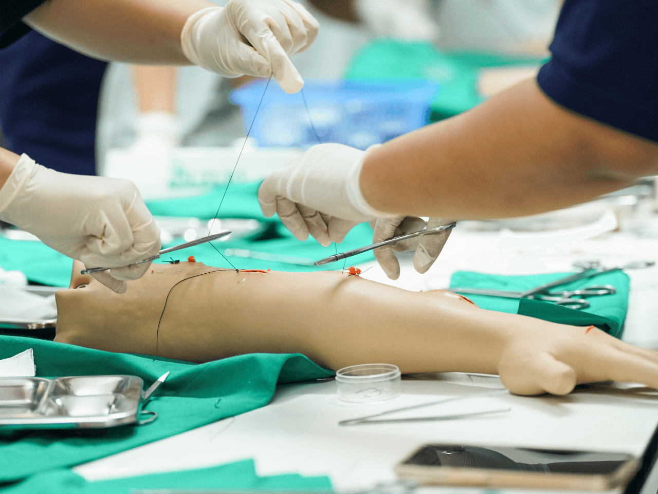 Nursing Students Practicing Surgical Suturing.